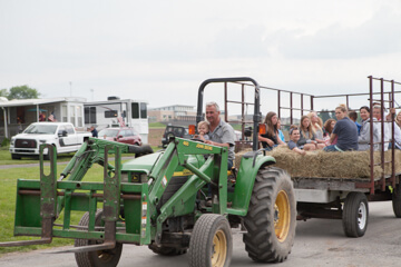 tractor pulling hay wagon